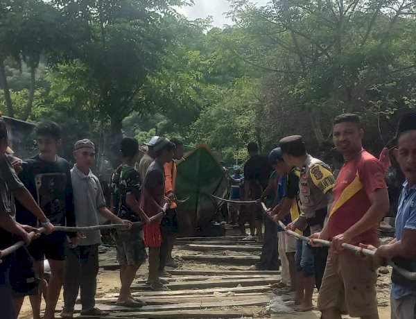 Gotong Royong di Pesisir Lenteng: AIPDA Yunus Hadir di Tengah Kegembiraan Nelayan Golo Mori