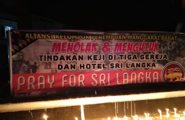 Sat lantas Polres Mabar Kawal Aksi Solidaritas Kenang Tragedi Bom Gereja Srilanka